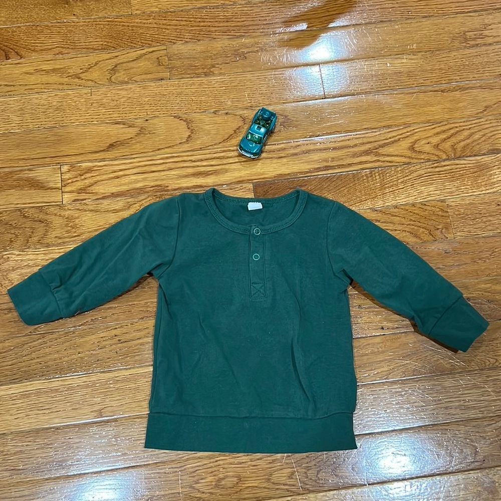 Green baby shirt size 6-9 months never worn